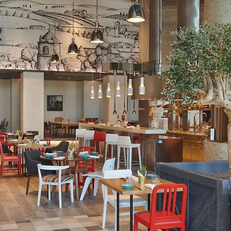 Hilton Salwa Beach Resort And Villas Abu Samra Exterior foto Restaurant