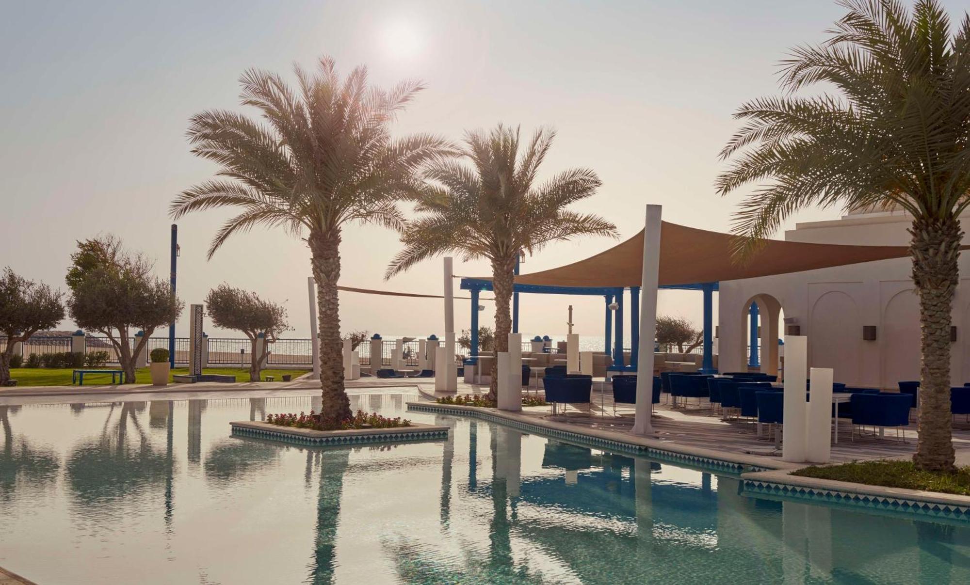 Hilton Salwa Beach Resort And Villas Abu Samra Exterior foto The Cove Rotana Resort