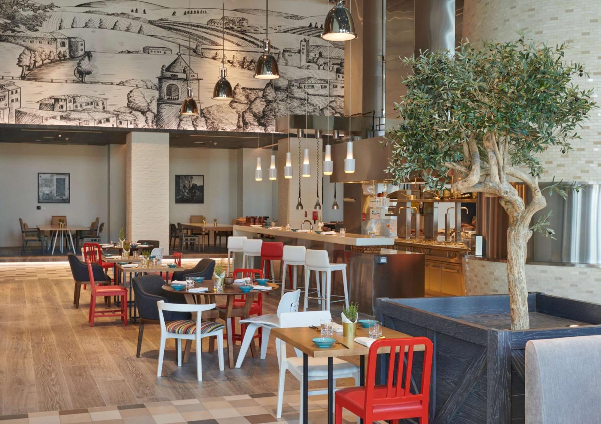 Hilton Salwa Beach Resort And Villas Abu Samra Exterior foto Restaurant